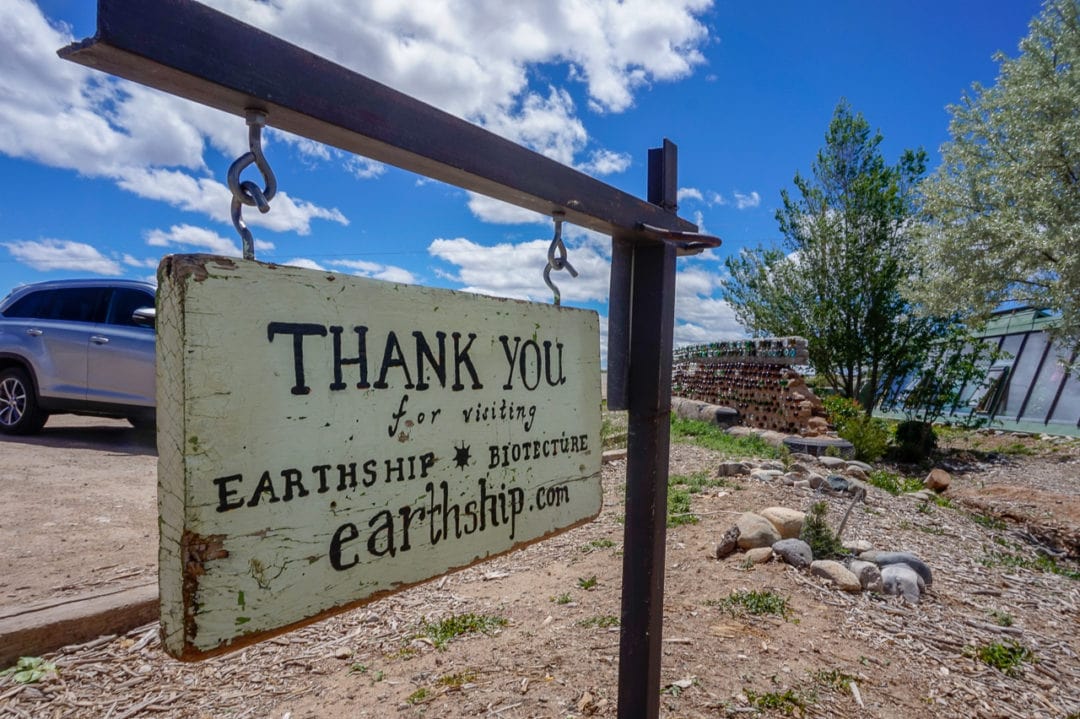 The welcome sign at Earthship Biotecture